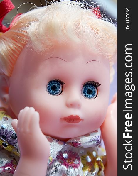 Closeup of the face of baby doll. Closeup of the face of baby doll