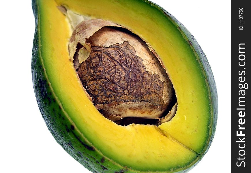 combination of green and yellow in a cut avocado