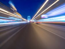 Speed Motion On The Neon Glowing Road At Dark. Royalty Free Stock Photography