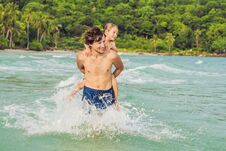 Dad Plays With His Son In The Sea Royalty Free Stock Photography Dad Plays With His Son In The Sea Royalty Free Stock Photography