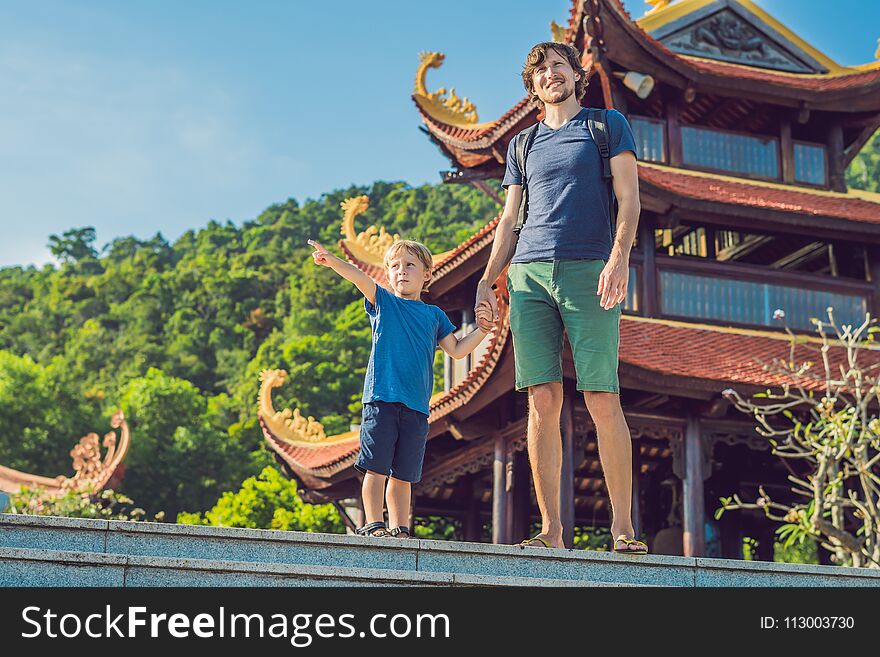 Happy Tourists Dad And Son In Pagoda. Travel To Asia Concept. Traveling With A Baby Concept