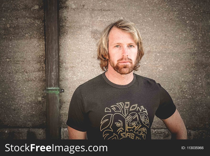 Photography of a Man Wearing Black Shirt