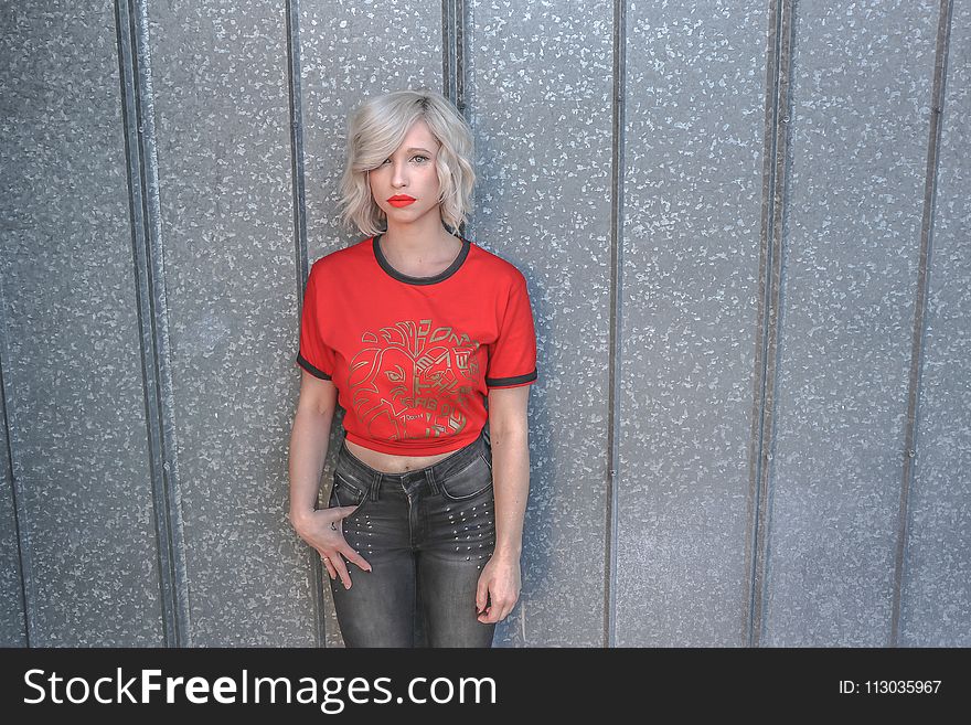 Woman in Red Shirt and Black Pants