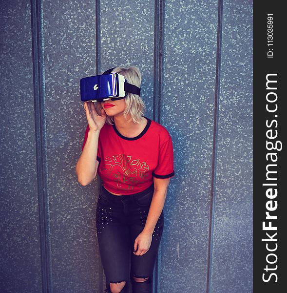 Photo of a Woman Wearing Virtual Reality Headset