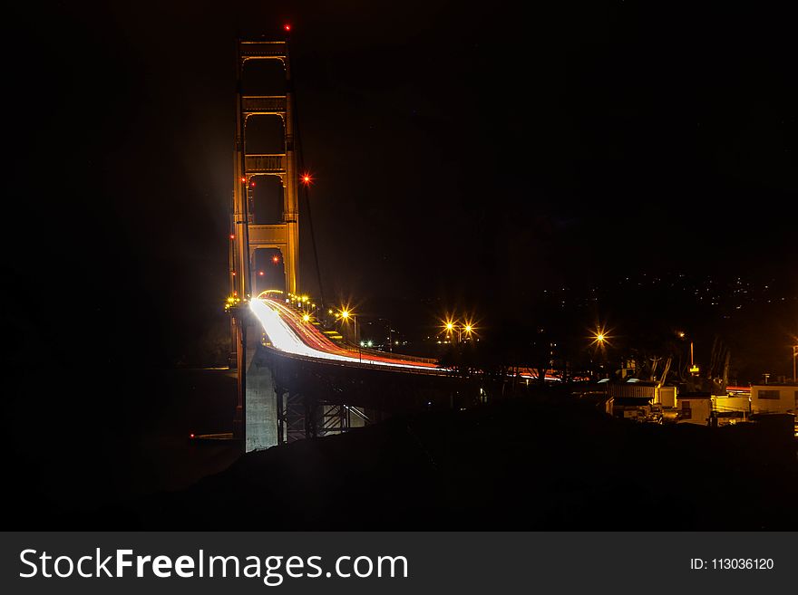 Photography of Bridge at Night