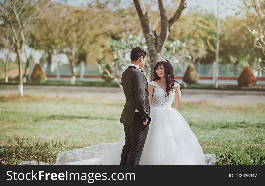 Photo of Bride and Groom Talking