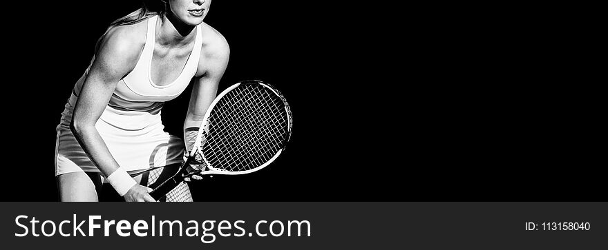 Tennis woman holding a tennis racket