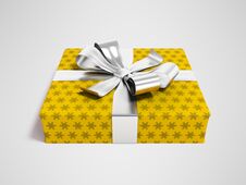 Gift In Yellow Paper With Bow 3d Rendering On Gray Background Wi Royalty Free Stock Image