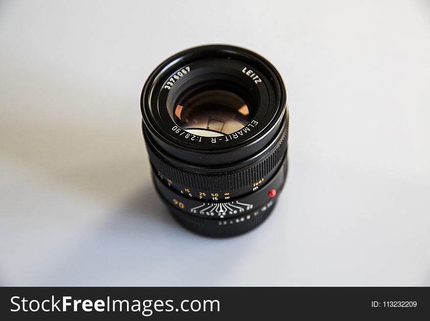 Photo Of Black Zoom Lens On White Surface