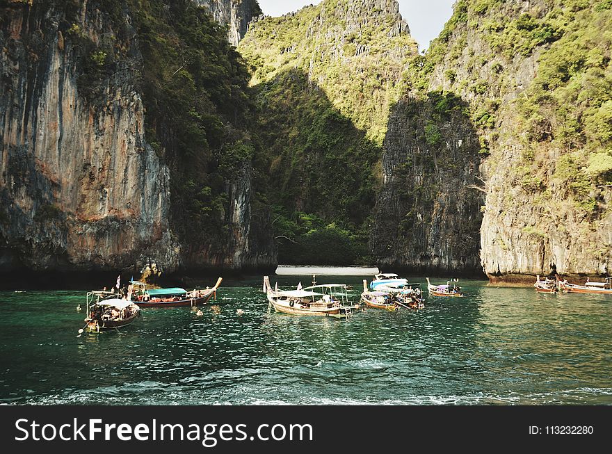 Brown Wooden Boats On River