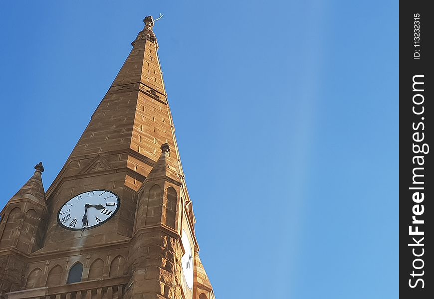 Photo of Brown Clock Tower