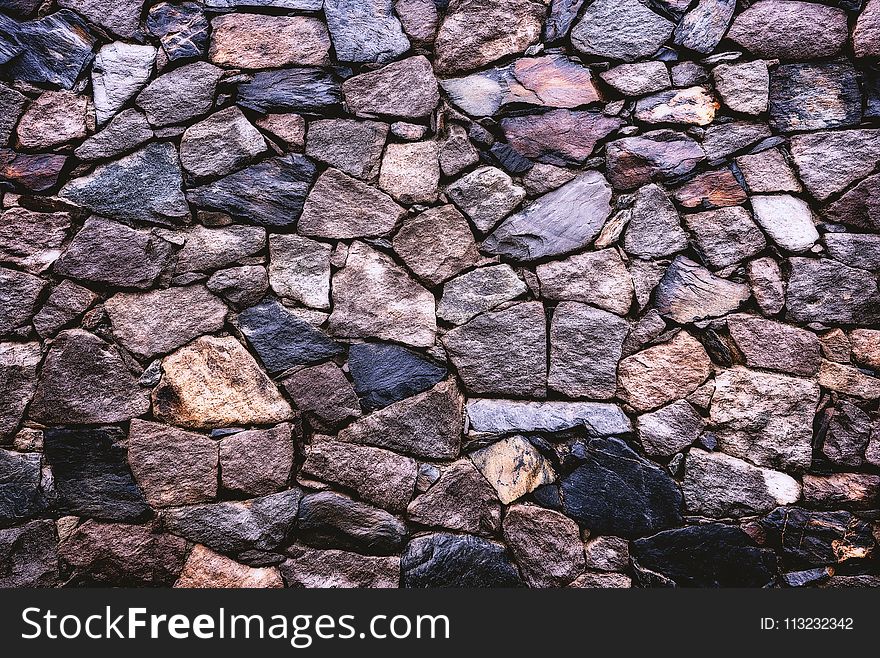 Grey and Brown Brick Wall