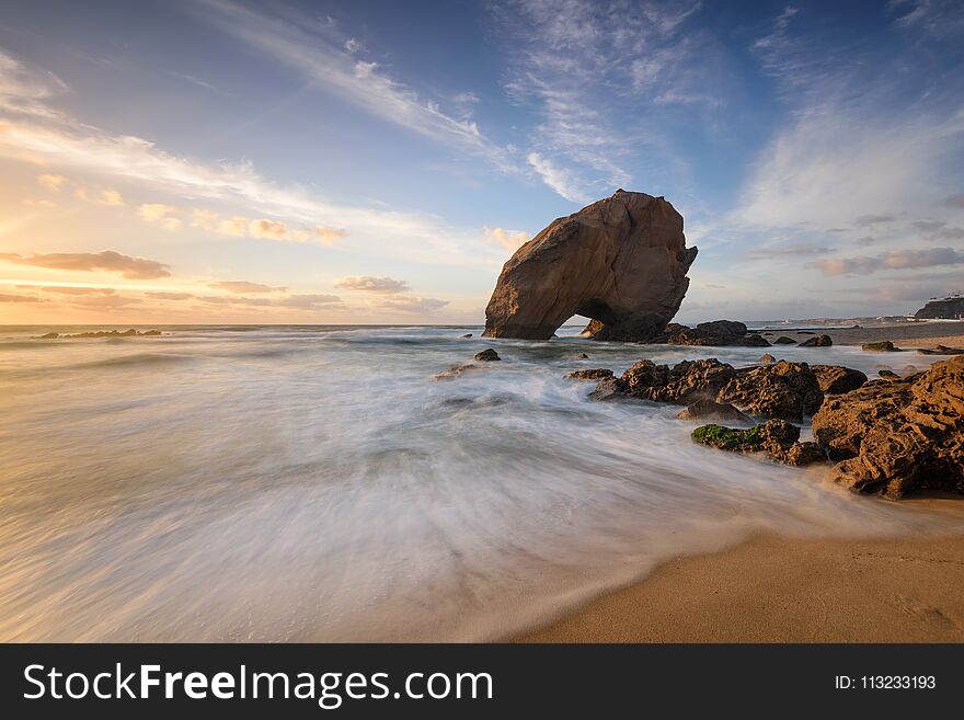 Amazing Sunset Beach on the coast of Portugal. Panoramic landscape of a holiday destination. Fine art seascape.