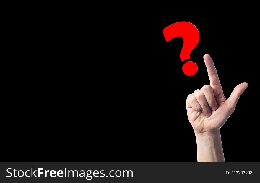 finger points to question marks on black isolated background. concept of the question. the problem of choice, meditation, a difficult question/