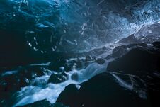 Running Stream In An Emerald Blue Ice Cave Of Vatnajokull Ice Glacier Royalty Free Stock Photos