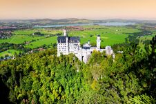 Famous Neuschwanstein Castle, 19th-century Romanesque Revival Palace On A Rugged Hill Above The Village Of Hohenschwangau In South Royalty Free Stock Images
