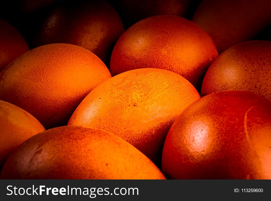 eggs colored with natural dye on brown dish. eggs colored with natural dye on brown dish