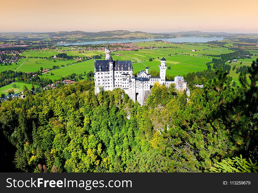 Famous Neuschwanstein Castle, 19th-century Romanesque Revival palace on a rugged hill above the village of Hohenschwangau in south