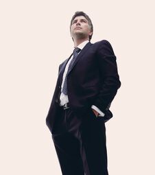 Free In Full Growth. Confident Young Businessman Stock Photos - 113275133