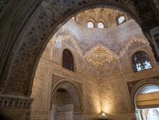 GRANADA, SPAIN - March 2018: Arches And Columns Of Alhambra. It Is A Palace And Fortress Complex Located In Granada. Stock Photo