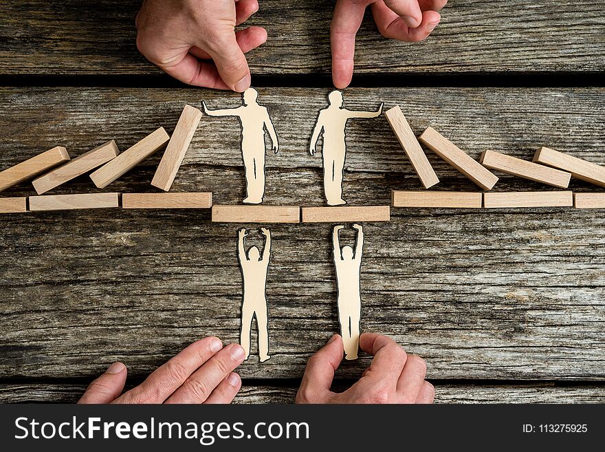 Business teamwork and cooperation concept with the hands of four