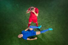 Male Soccer Player Suffering From Leg Injury On Football Green Field Royalty Free Stock Photography