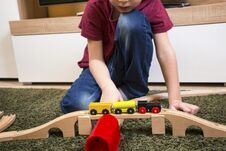 Child Boy Play With Wooden Train, Build Toy Railroad At Home Or Stock Image