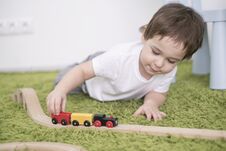 Small Toddler In A Colorful Children Room In A Nursery Or Preschool. Child Boy Playing With Toys Indicators At Home Royalty Free Stock Photos