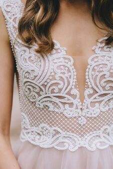 Beautiful Soft Lace On The Corset Of A Stylish Wedding Beige Dress Adorned With Beads And Embroidery On The Bride Royalty Free Stock Photo