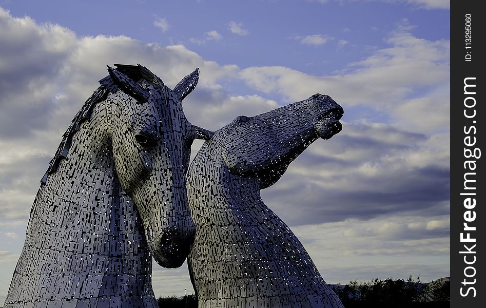 Two Gray Horse Statues