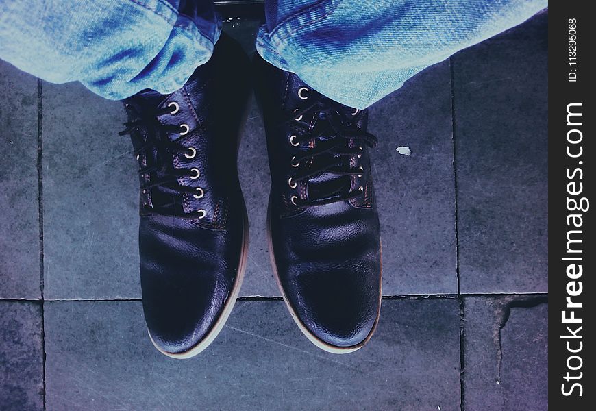 Photo of Man Wearing Black Leather Shoes