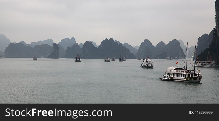 Boats Sailing Out On Halong Bay, In Vietnam