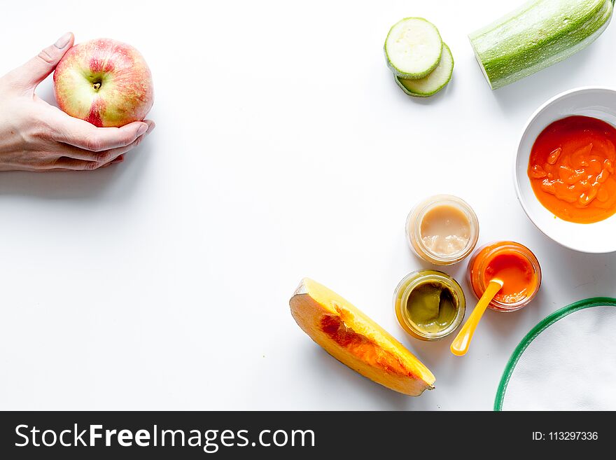 Cooking vegetable puree for baby on white background top view.