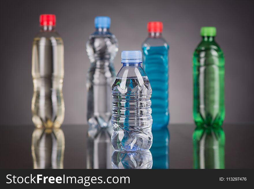 Plastic bottle on the blue background