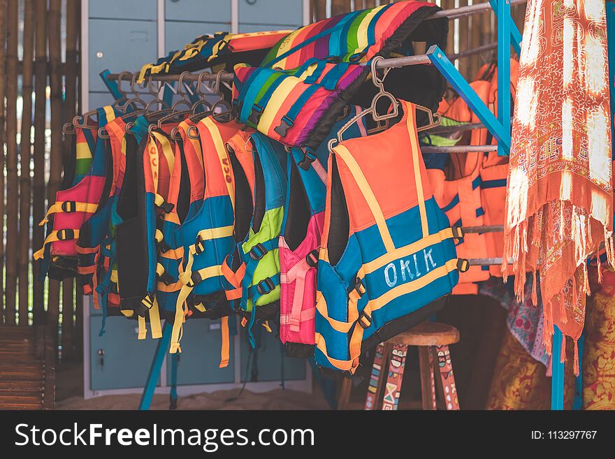 Group of Life jacket or life vest on the beach. Bali island.