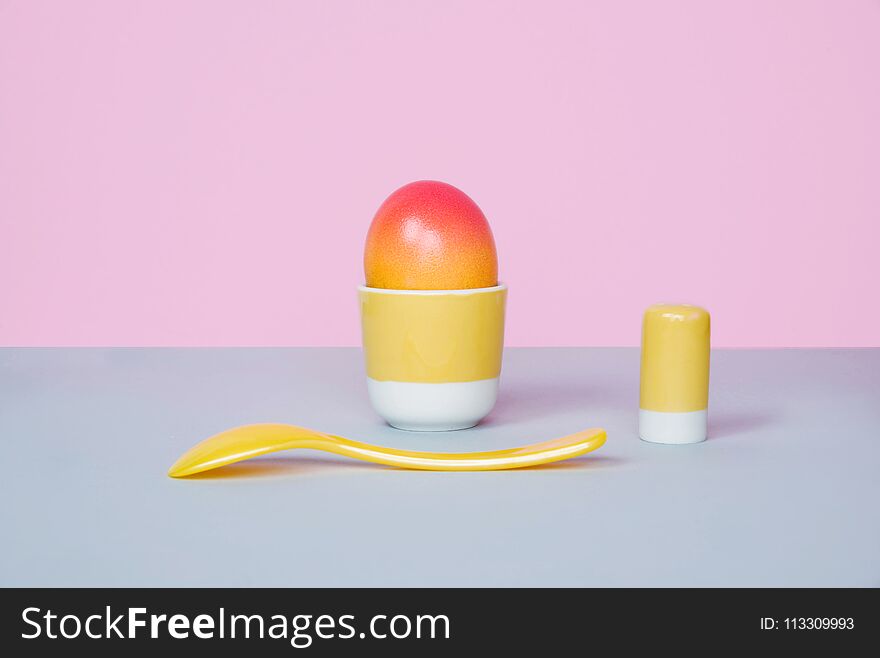 Easter egg on pastel background.