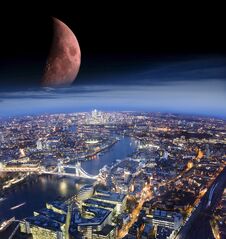 Abstract Scene Of London City At Night With Moon Added From Another Photo Stock Photo