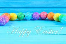 Colorful Easter Egg On Blue Pastel Color Wood Background With Space. Happy Easter. Stock Photos