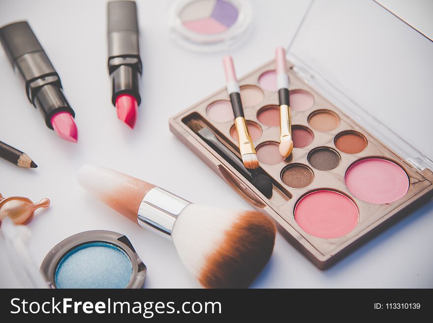 Set of decorative cosmetics for women on white background