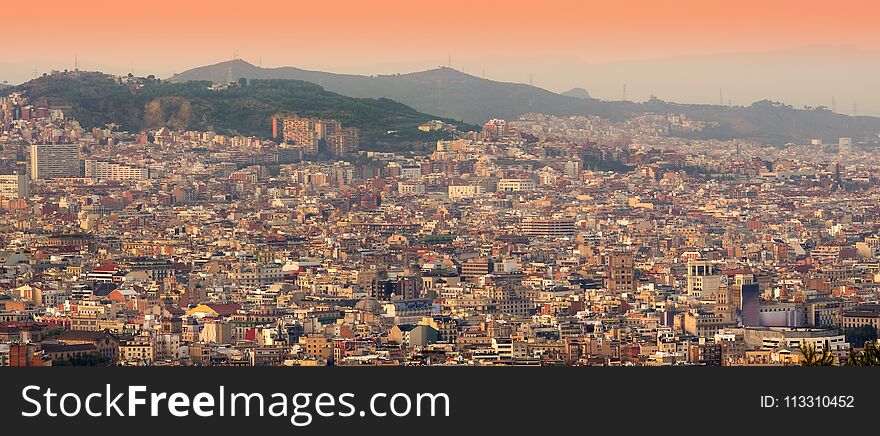 Barcelona Cityscape At Sunset.