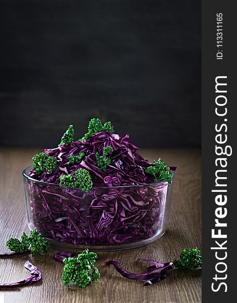 Red cabbage on the wooden background Organic foods