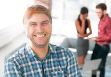 Casual Businessman With Arms Crossed Standing In The Office Royalty Free Stock Photos Casual Businessman With Arms Crossed Standing In The Office Royalty Free Stock Photos