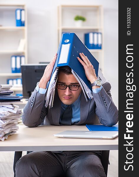 The Overloaded With Work Employee Under Paperwork Burden