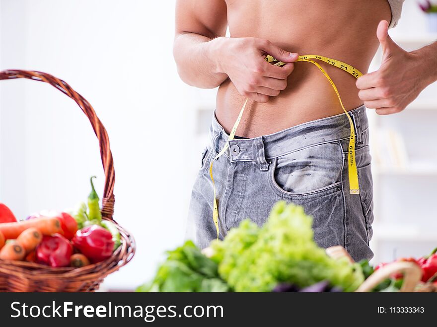 The young man in healthy eating and dieting concept