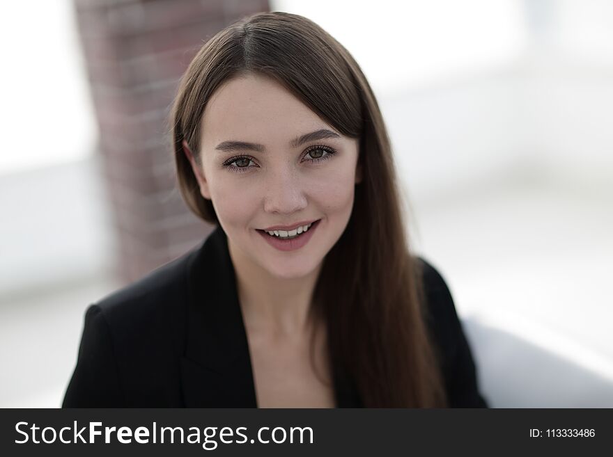 Face of beautiful woman on office background. Face of beautiful woman on office background