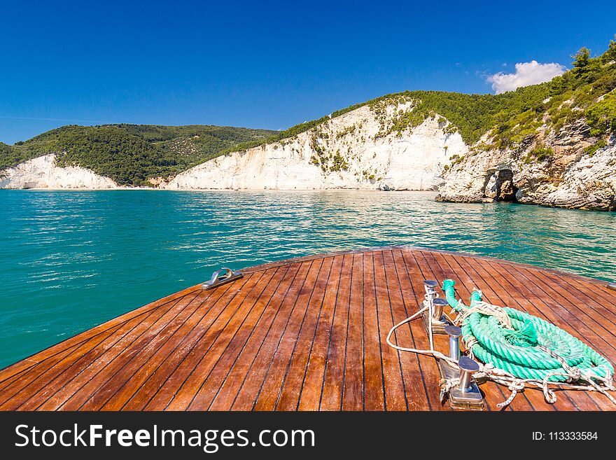 Trip boat from the Vignanotica beach, in Apulia region, south Italy. Trip boat from the Vignanotica beach, in Apulia region, south Italy