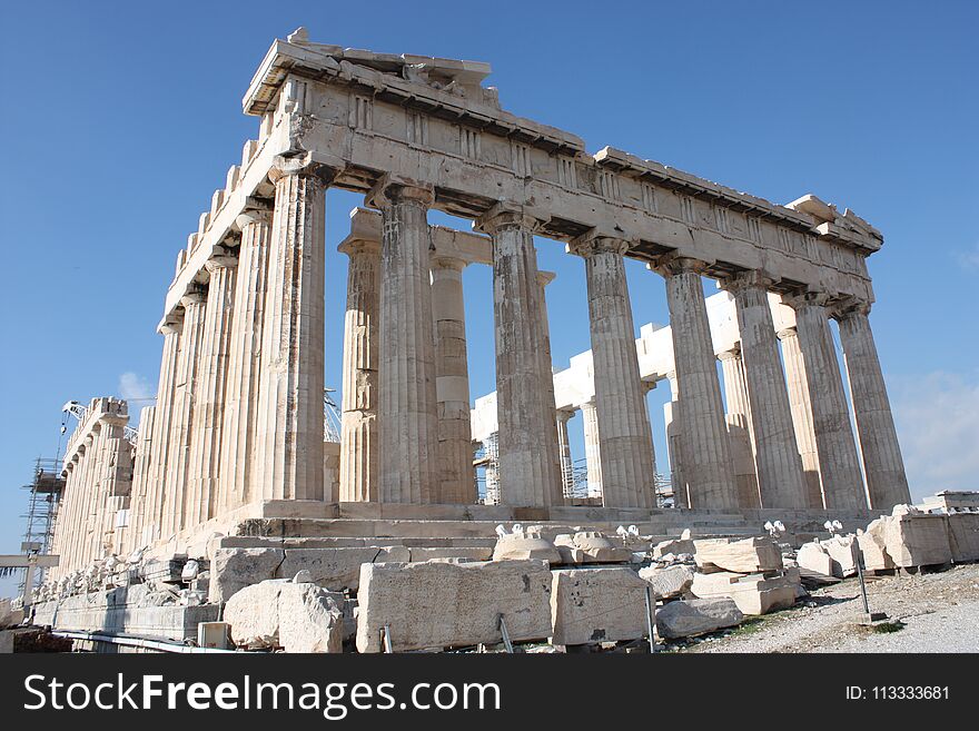 Acropolis of Athens Greece.The Acropolis of Athens is an ancient citadel located on a rocky outcrop above the city of Athens and contains the remains of several ancient buildings of great architectural and historic significance, the most famous being the Parthenon. UNESCO World Heritage Centre