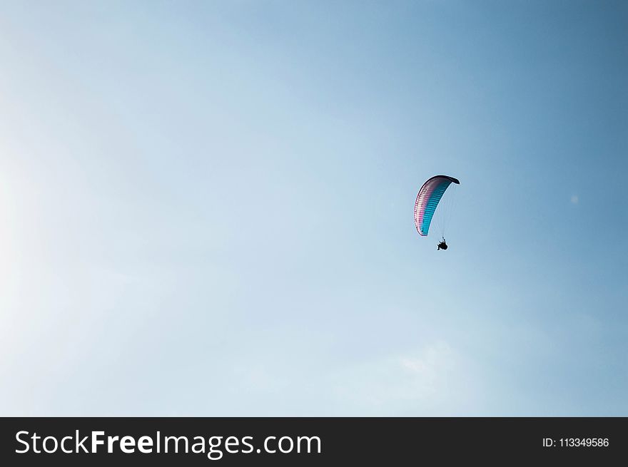 Photo of a Person Paragliding