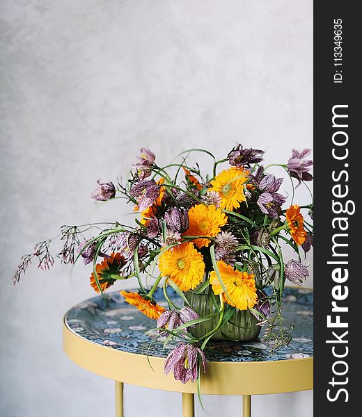 Potted Yellow and Purple Cluster Flowers
