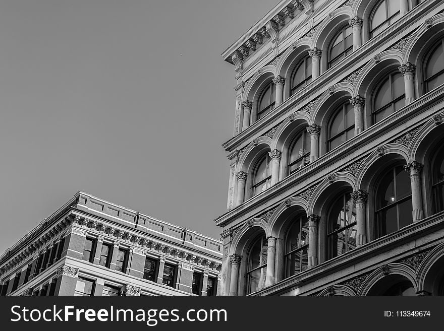 Grayscale Photography Of Concrete Buildings